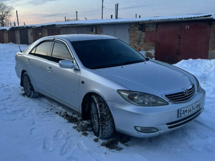 Серый Тойота Камри, объемом двигателя 2.4 л и пробегом 434 тыс. км за 4300 $, фото 1 на Automoto.ua