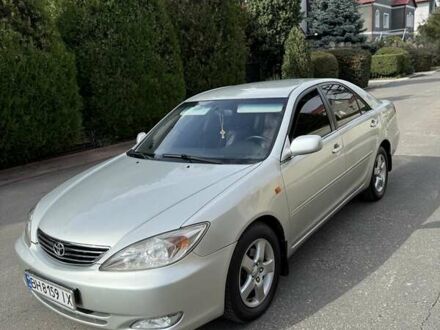 Серый Тойота Камри, объемом двигателя 3 л и пробегом 215 тыс. км за 6800 $, фото 1 на Automoto.ua