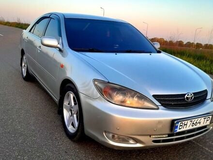 Сірий Тойота Камрі, об'ємом двигуна 3 л та пробігом 230 тис. км за 6500 $, фото 1 на Automoto.ua