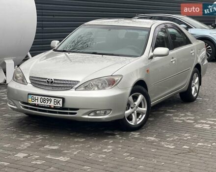 Сірий Тойота Камрі, об'ємом двигуна 2.4 л та пробігом 216 тис. км за 5999 $, фото 1 на Automoto.ua