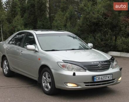 Серый Тойота Камри, объемом двигателя 2.4 л и пробегом 375 тыс. км за 5500 $, фото 1 на Automoto.ua