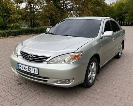 Серый Тойота Камри, объемом двигателя 3 л и пробегом 303 тыс. км за 4500 $, фото 1 на Automoto.ua