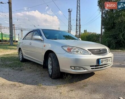 Сірий Тойота Камрі, об'ємом двигуна 2.4 л та пробігом 403 тис. км за 5300 $, фото 1 на Automoto.ua