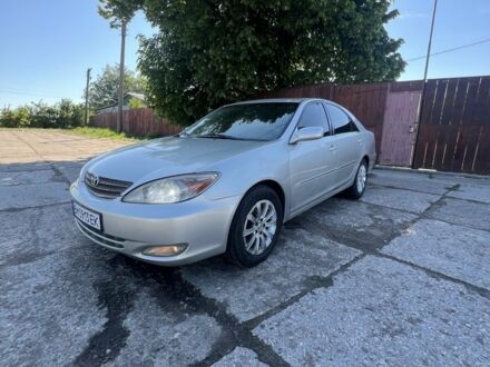 Серый Тойота Камри, объемом двигателя 3 л и пробегом 322 тыс. км за 4500 $, фото 1 на Automoto.ua