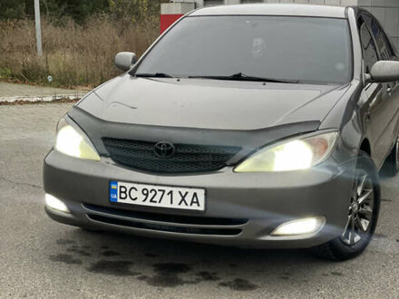 Сірий Тойота Камрі, об'ємом двигуна 3 л та пробігом 384 тис. км за 5500 $, фото 1 на Automoto.ua