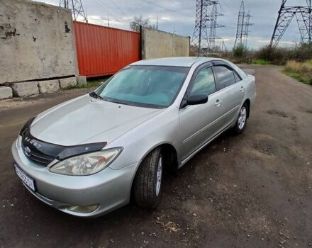 Серый Тойота Камри, объемом двигателя 2.4 л и пробегом 300 тыс. км за 4200 $, фото 1 на Automoto.ua