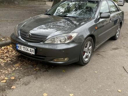 Серый Тойота Камри, объемом двигателя 2.4 л и пробегом 370 тыс. км за 4800 $, фото 1 на Automoto.ua