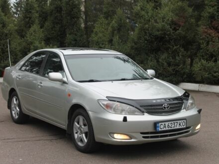 Серый Тойота Камри, объемом двигателя 2.4 л и пробегом 375 тыс. км за 5550 $, фото 1 на Automoto.ua