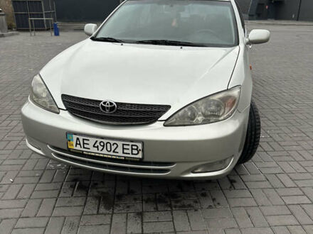 Серый Тойота Камри, объемом двигателя 3 л и пробегом 205 тыс. км за 4500 $, фото 1 на Automoto.ua