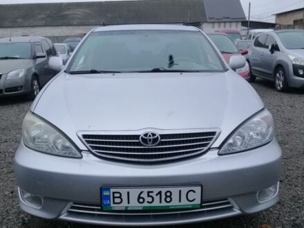 Серый Тойота Камри, объемом двигателя 2.4 л и пробегом 280 тыс. км за 4850 $, фото 1 на Automoto.ua