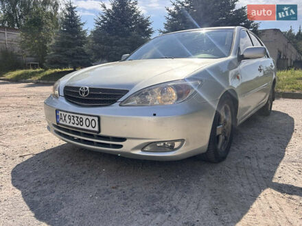 Серый Тойота Камри, объемом двигателя 2.4 л и пробегом 214 тыс. км за 5500 $, фото 1 на Automoto.ua