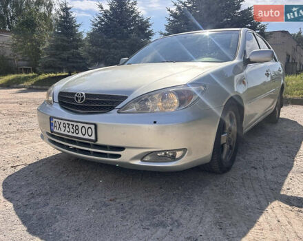 Серый Тойота Камри, объемом двигателя 2.4 л и пробегом 214 тыс. км за 5500 $, фото 1 на Automoto.ua