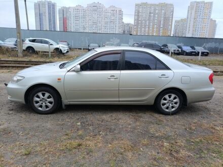 Серый Тойота Камри, объемом двигателя 2.4 л и пробегом 390 тыс. км за 5000 $, фото 1 на Automoto.ua