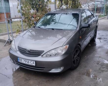 Серый Тойота Камри, объемом двигателя 2.4 л и пробегом 250 тыс. км за 4500 $, фото 1 на Automoto.ua