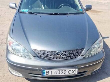 Сірий Тойота Камрі, об'ємом двигуна 2.4 л та пробігом 323 тис. км за 5200 $, фото 1 на Automoto.ua