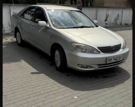 Серый Тойота Камри, объемом двигателя 2.4 л и пробегом 300 тыс. км за 4700 $, фото 1 на Automoto.ua