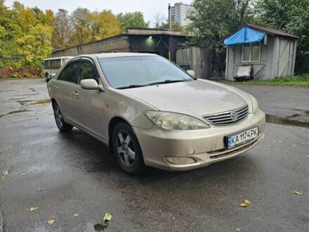 Серый Тойота Камри, объемом двигателя 3 л и пробегом 200 тыс. км за 3700 $, фото 1 на Automoto.ua