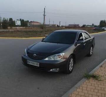 Серый Тойота Камри, объемом двигателя 2.36 л и пробегом 350 тыс. км за 4500 $, фото 1 на Automoto.ua