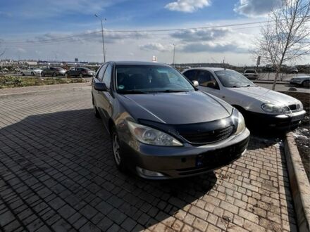 Серый Тойота Камри, объемом двигателя 2.4 л и пробегом 346 тыс. км за 5100 $, фото 1 на Automoto.ua