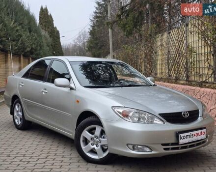 Серый Тойота Камри, объемом двигателя 3 л и пробегом 245 тыс. км за 6499 $, фото 1 на Automoto.ua