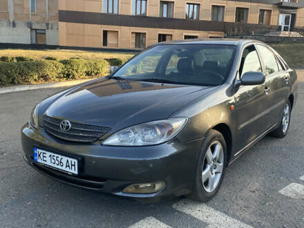 Сірий Тойота Камрі, об'ємом двигуна 2.4 л та пробігом 370 тис. км за 4800 $, фото 1 на Automoto.ua