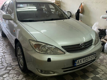 Серый Тойота Камри, объемом двигателя 2.4 л и пробегом 400 тыс. км за 5300 $, фото 1 на Automoto.ua