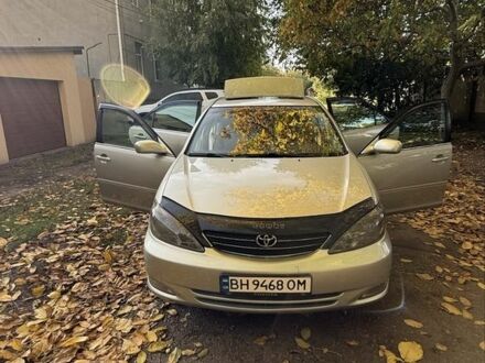 Сірий Тойота Камрі, об'ємом двигуна 3 л та пробігом 242 тис. км за 6200 $, фото 1 на Automoto.ua