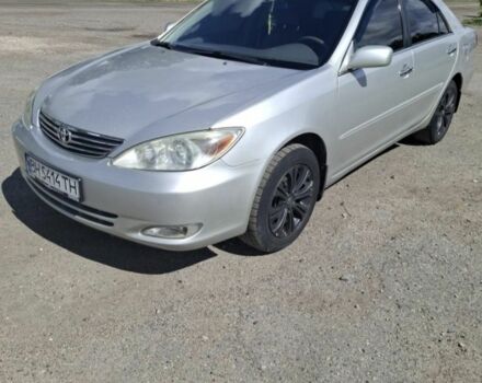 Серый Тойота Камри, объемом двигателя 3 л и пробегом 387 тыс. км за 6100 $, фото 1 на Automoto.ua