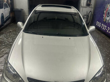 Сірий Тойота Камрі, об'ємом двигуна 3 л та пробігом 242 тис. км за 4300 $, фото 1 на Automoto.ua