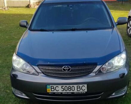 Серый Тойота Камри, объемом двигателя 2.4 л и пробегом 420 тыс. км за 4000 $, фото 1 на Automoto.ua