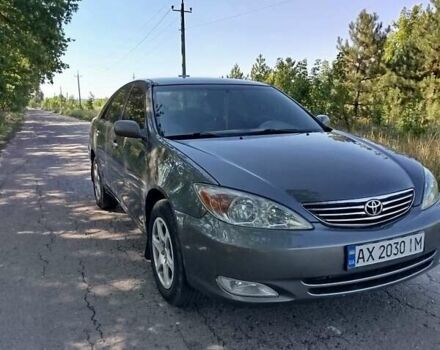 Серый Тойота Камри, объемом двигателя 2.4 л и пробегом 315 тыс. км за 6100 $, фото 1 на Automoto.ua