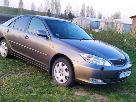 Сірий Тойота Камрі, об'ємом двигуна 2.4 л та пробігом 199 тис. км за 5700 $, фото 1 на Automoto.ua