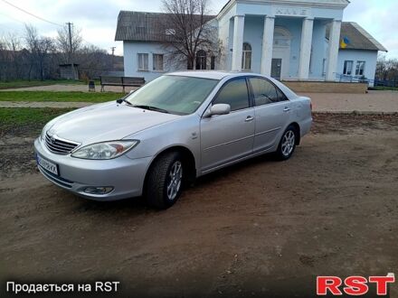 Сірий Тойота Камрі, об'ємом двигуна 2.4 л та пробігом 266 тис. км за 6750 $, фото 1 на Automoto.ua