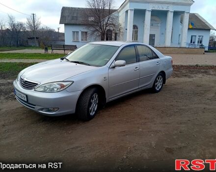 Сірий Тойота Камрі, об'ємом двигуна 2.4 л та пробігом 266 тис. км за 6750 $, фото 1 на Automoto.ua