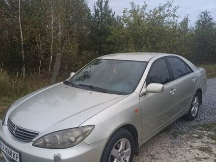 Серый Тойота Камри, объемом двигателя 2.36 л и пробегом 260 тыс. км за 6700 $, фото 1 на Automoto.ua