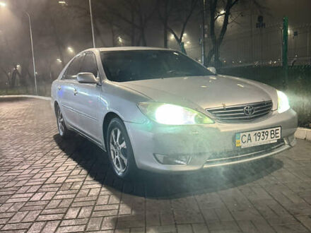 Серый Тойота Камри, объемом двигателя 3 л и пробегом 240 тыс. км за 7200 $, фото 1 на Automoto.ua