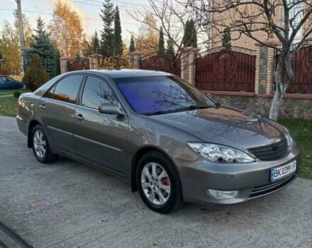 Серый Тойота Камри, объемом двигателя 3 л и пробегом 420 тыс. км за 5800 $, фото 1 на Automoto.ua