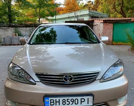 Сірий Тойота Камрі, об'ємом двигуна 2.4 л та пробігом 185 тис. км за 7999 $, фото 1 на Automoto.ua
