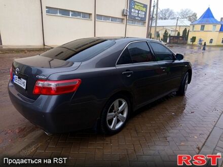 Серый Тойота Камри, объемом двигателя 2.4 л и пробегом 280 тыс. км за 9100 $, фото 1 на Automoto.ua