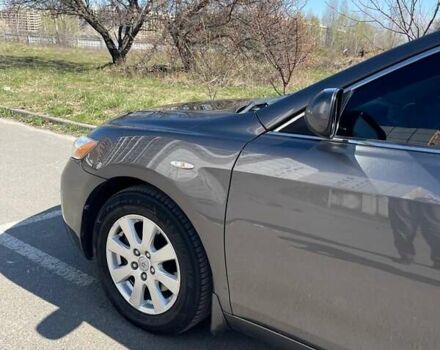 Серый Тойота Камри, объемом двигателя 2.4 л и пробегом 260 тыс. км за 8700 $, фото 1 на Automoto.ua