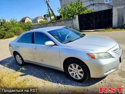 Серый Тойота Камри, объемом двигателя 2.4 л и пробегом 290 тыс. км за 7000 $, фото 1 на Automoto.ua