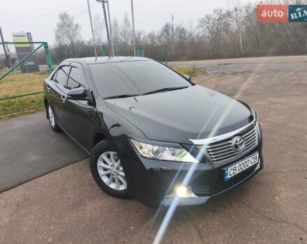Серый Тойота Камри, объемом двигателя 2.5 л и пробегом 244 тыс. км за 14900 $, фото 1 на Automoto.ua