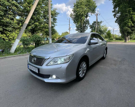 Серый Тойота Камри, объемом двигателя 2.49 л и пробегом 230 тыс. км за 11500 $, фото 1 на Automoto.ua