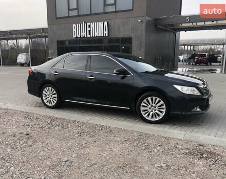 Сірий Тойота Камрі, об'ємом двигуна 2.49 л та пробігом 320 тис. км за 14700 $, фото 1 на Automoto.ua