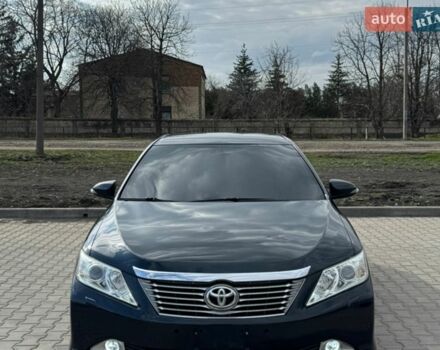 Серый Тойота Камри, объемом двигателя 2.5 л и пробегом 240 тыс. км за 11000 $, фото 1 на Automoto.ua