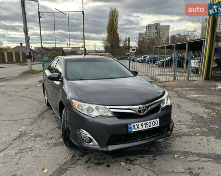 Серый Тойота Камри, объемом двигателя 2.49 л и пробегом 220 тыс. км за 8500 $, фото 1 на Automoto.ua