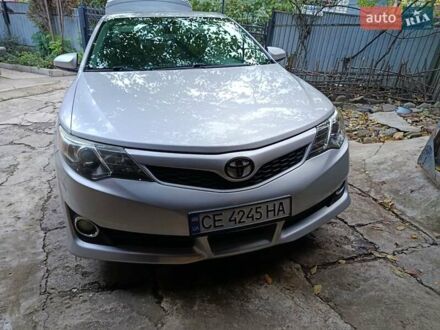 Серый Тойота Камри, объемом двигателя 2.5 л и пробегом 200 тыс. км за 12000 $, фото 1 на Automoto.ua