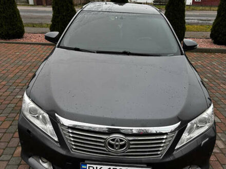 Сірий Тойота Камрі, об'ємом двигуна 2.49 л та пробігом 253 тис. км за 10799 $, фото 1 на Automoto.ua