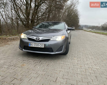 Сірий Тойота Камрі, об'ємом двигуна 2.4 л та пробігом 241 тис. км за 12600 $, фото 1 на Automoto.ua