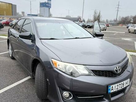 Серый Тойота Камри, объемом двигателя 2.49 л и пробегом 230 тыс. км за 11000 $, фото 1 на Automoto.ua